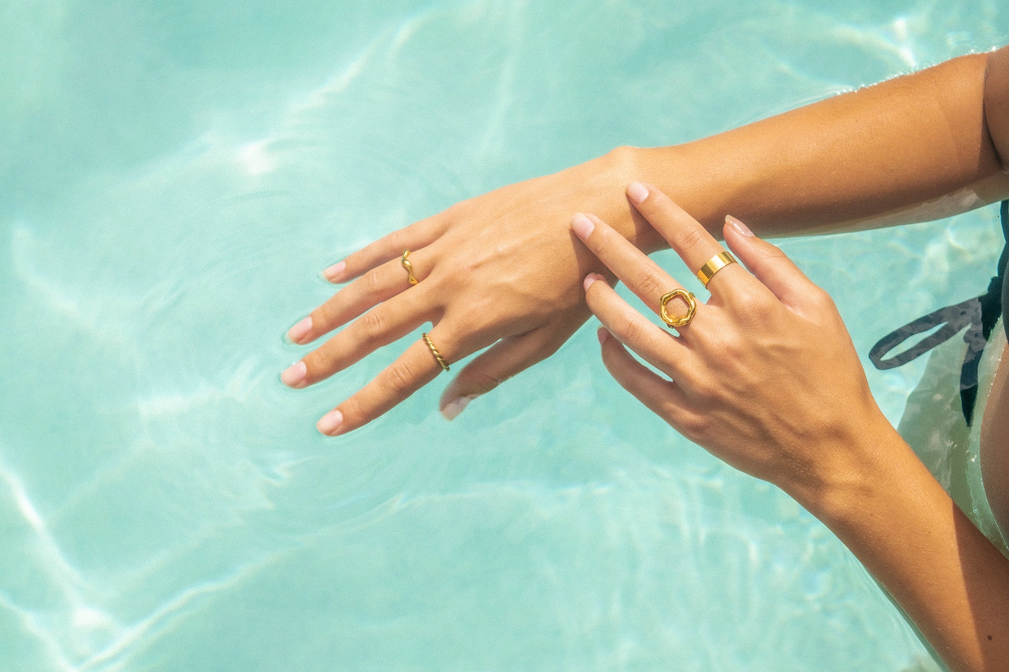 Swim In Jewelry waterproof jewelry and rings in a pool